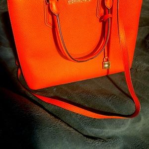 New WOT. Michael Kors orange hand bag with matching wallet